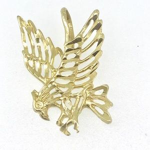 Large 14 kt yellow gold eagle pendant